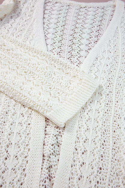Openwork Open Front Dropped Shoulder Cardigan with a textured openwork design and relaxed fit in cream color.